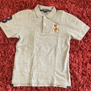 Youth size grey Polo ASSN shirt, Medium and In good condition!